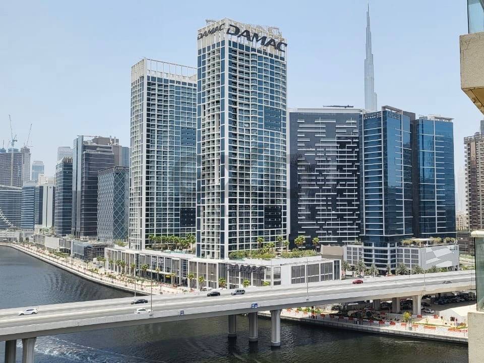 Furnished 1BR | Canal & Burj Khalifa Views| Upgraded