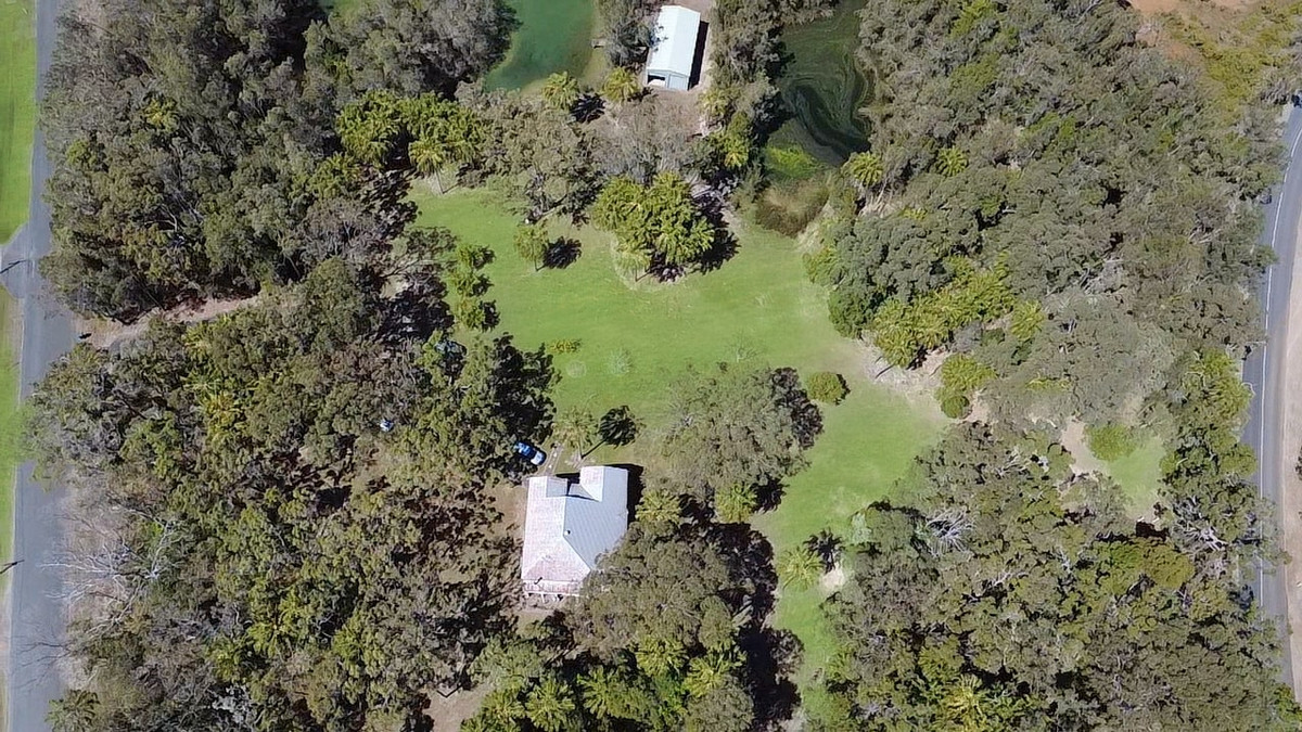 Rare Acreage Coastal Retreat with Private Lakes & Jetty!!