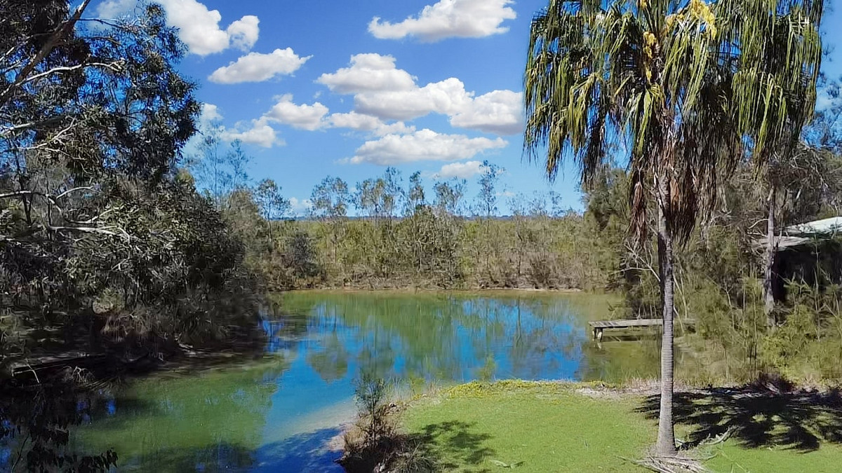 Rare Acreage Coastal Retreat with Private Lakes & Jetty!!