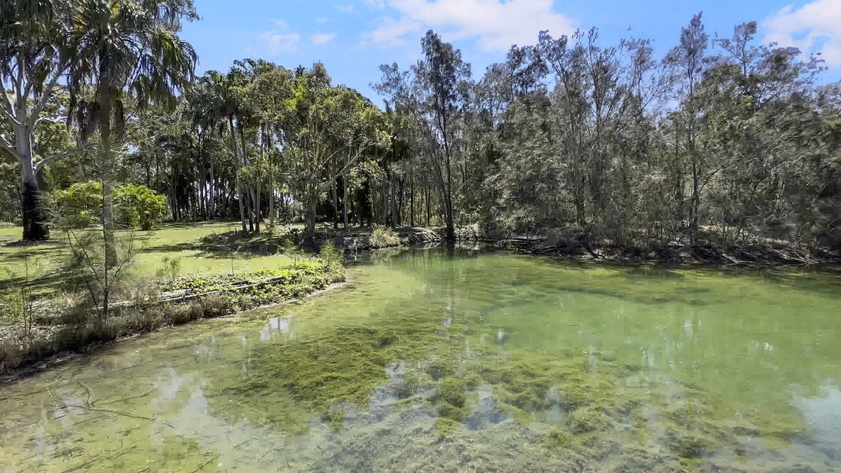 Rare Acreage Coastal Retreat with Private Lakes & Jetty!!