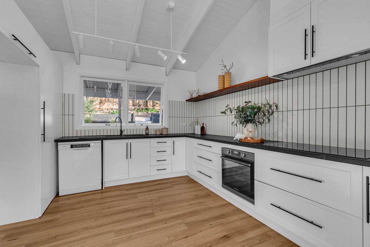 Offers Considered – Beautifully Renovated Family Home with City Views