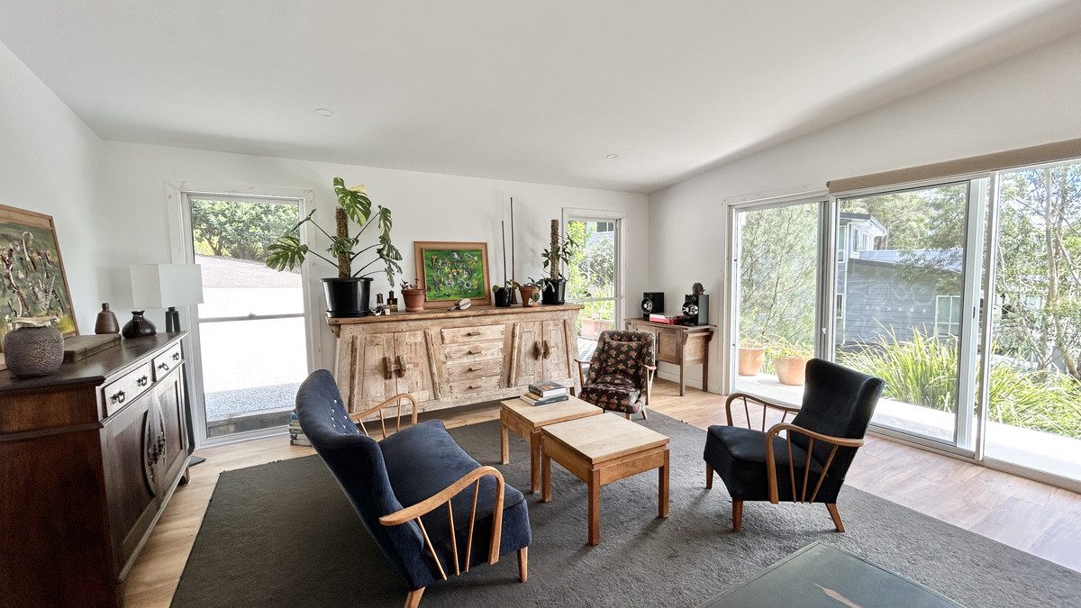 Sophisticated Coastal Living with Water Glimpses & Elevated Design