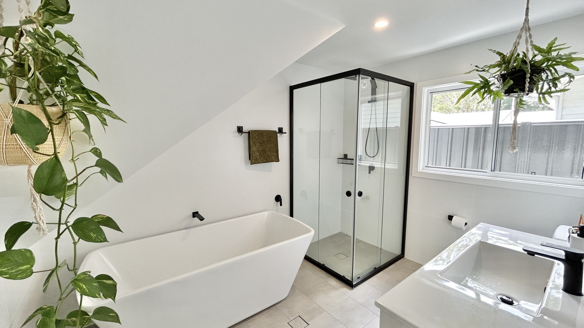 Sophisticated Coastal Living with Water Glimpses & Elevated Design