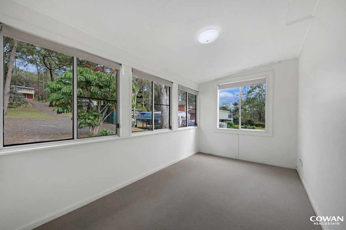 Absolute Waterfront on the Pristine Waters of North Arm Cove | Private Boat Ramp & Dual Dwelling Potential
