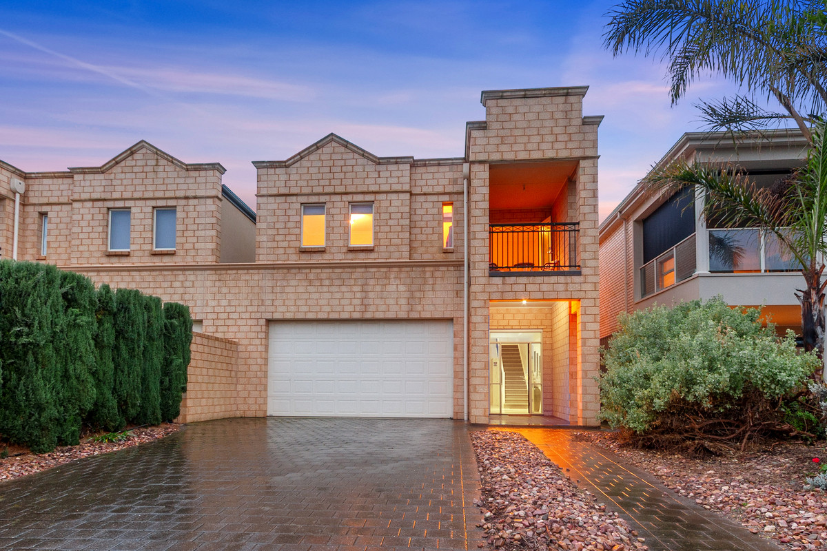Coastal Living Just Steps from the Beach in Sought-After “Blue Chip” location