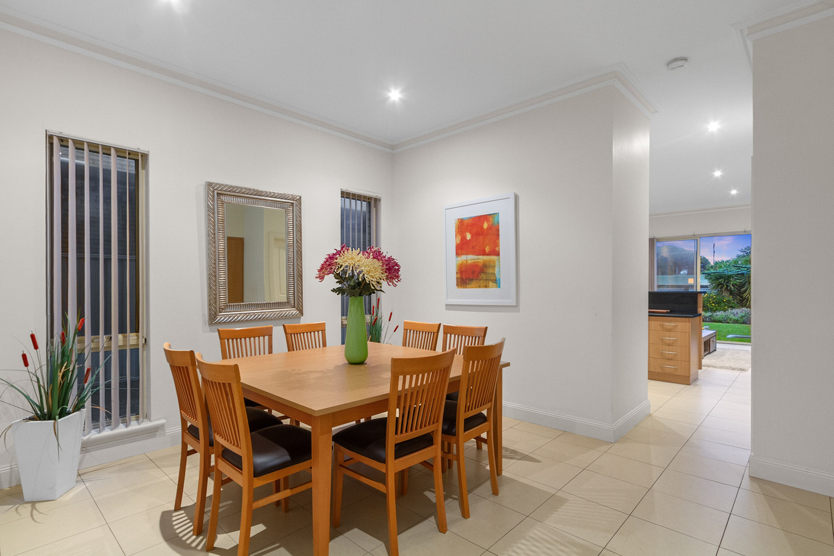 Coastal Living Just Steps from the Beach in Sought-After “Blue Chip” location