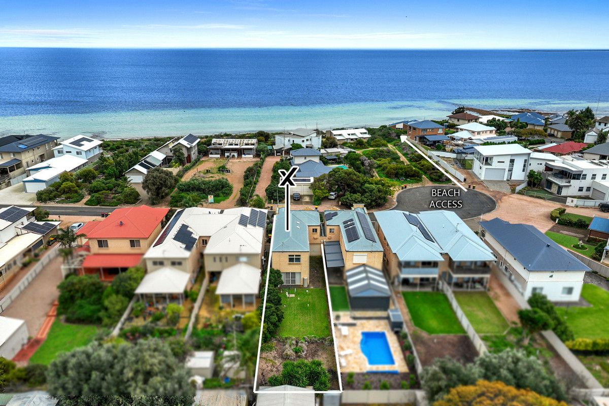 Coastal Living Just Steps from the Beach in Sought-After “Blue Chip” location