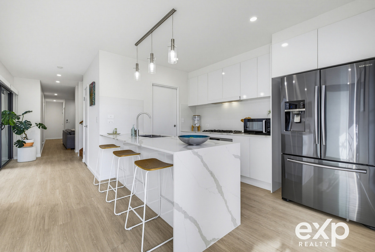 Near-New Terrace Home, Modern, Low-Maintenance Living at Its Best
