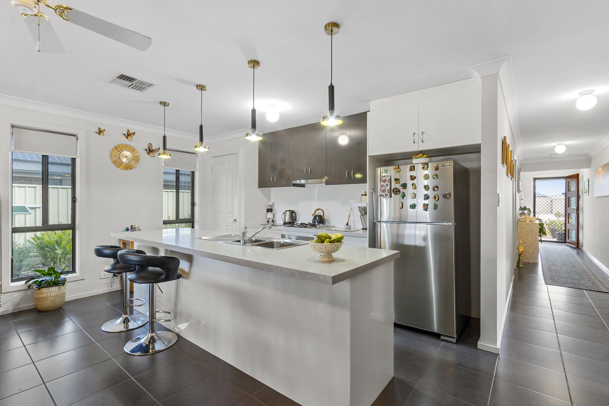 Modern four-bedroom home with solar, battery, alfresco & bali hut
