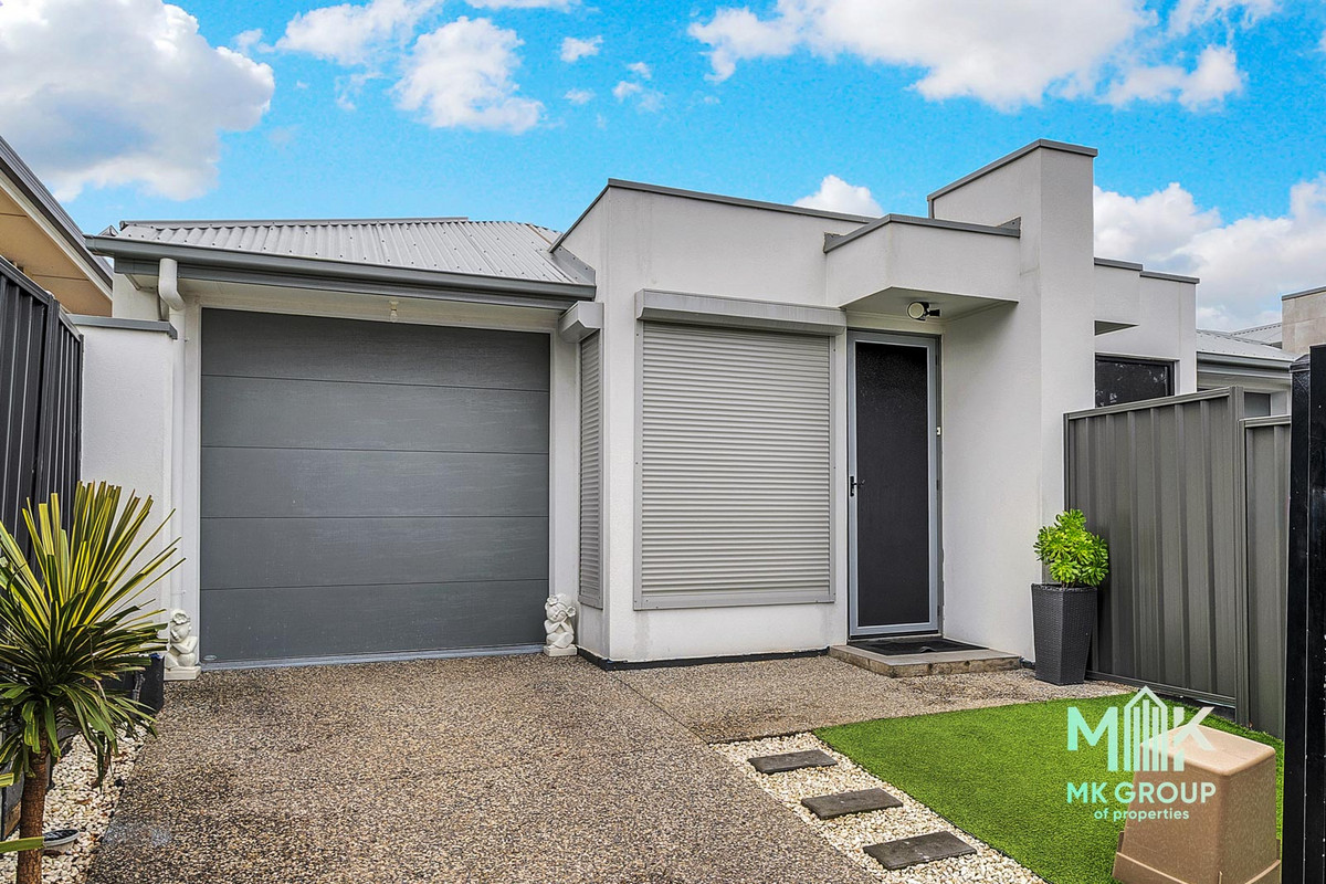 STYLISH, LOW-MAINTENANCE LIVING IN THE HEART OF HOLDEN HILL.
