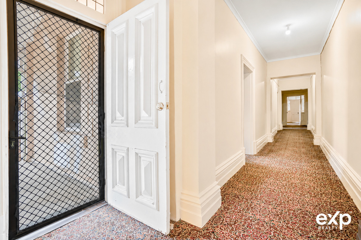 Leased & Loaded — The Historic Brinkworth Bank with Big Returns & Commercial Upside