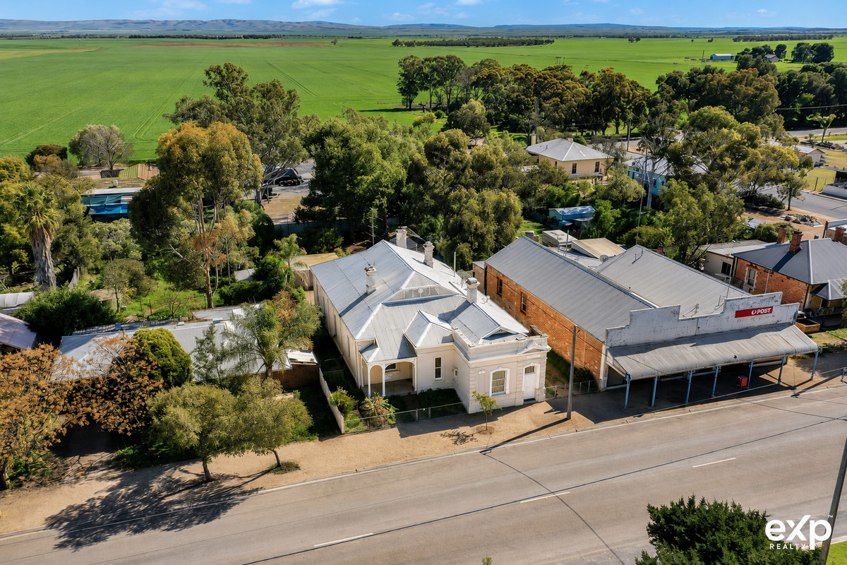 Leased & Loaded — The Historic Brinkworth Bank with Big Returns & Commercial Upside
