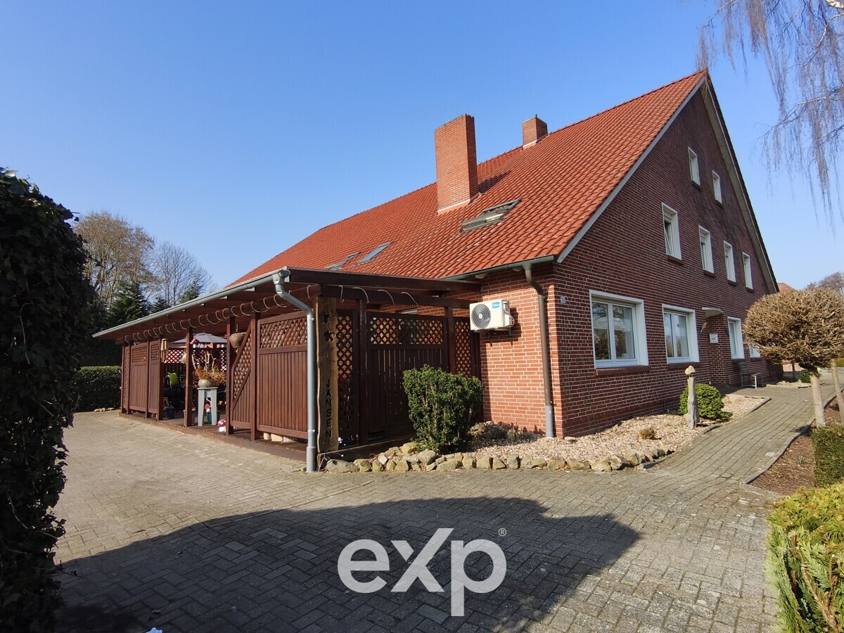 Exklusive Gelegenheit: Mehrparteienhaus mit drei Wohneinheiten auf großem Grundstück in Surwold