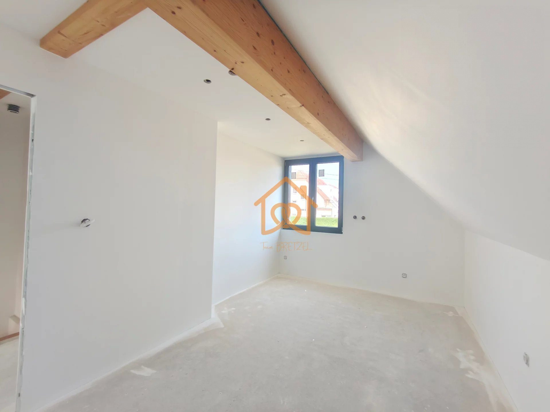 In Geispolsheim Village: Apartment with garage, parking and one are of land 4