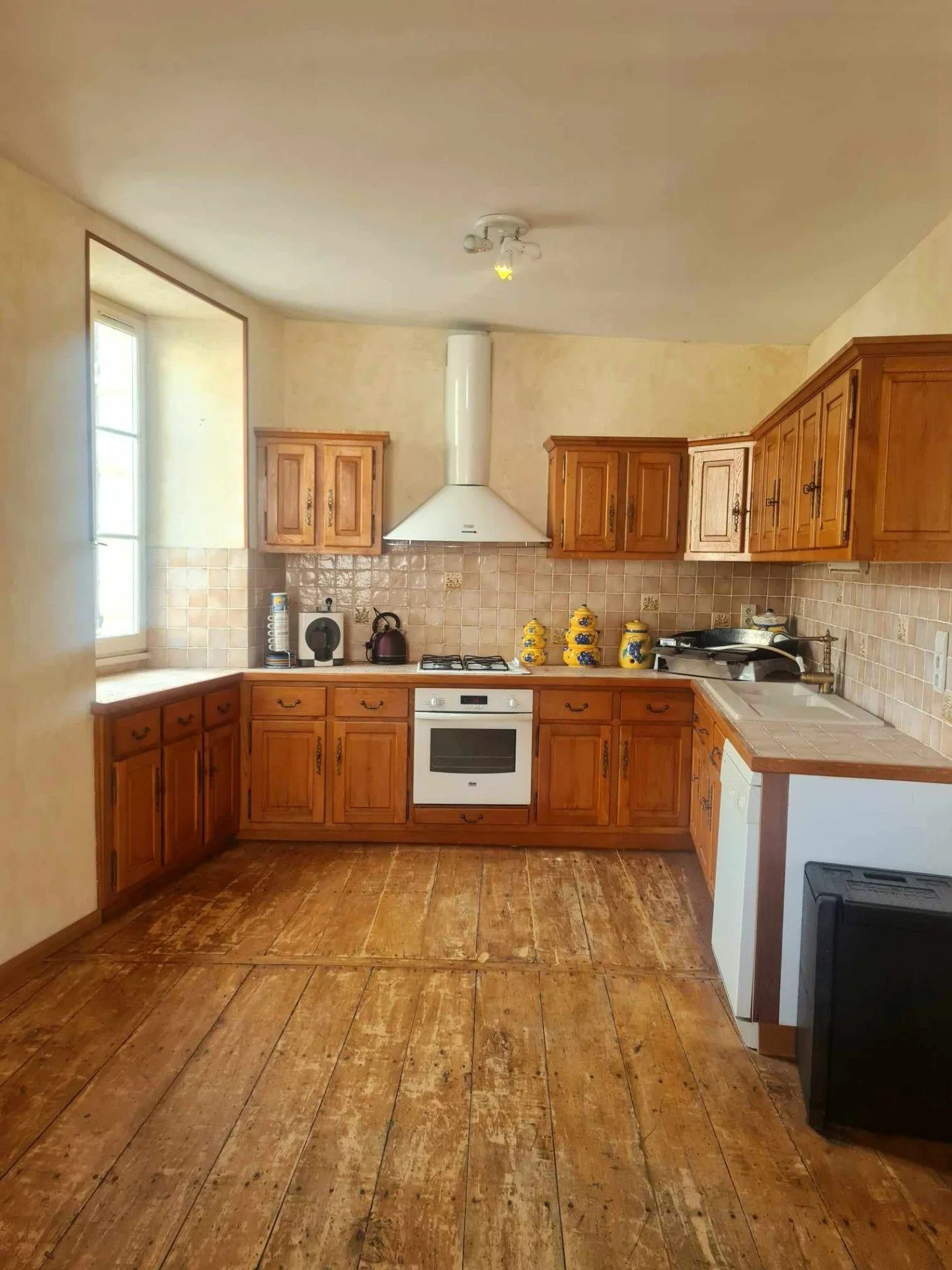 In the Heart of Aubeterre Building with Commercial Space and Apartment 3
