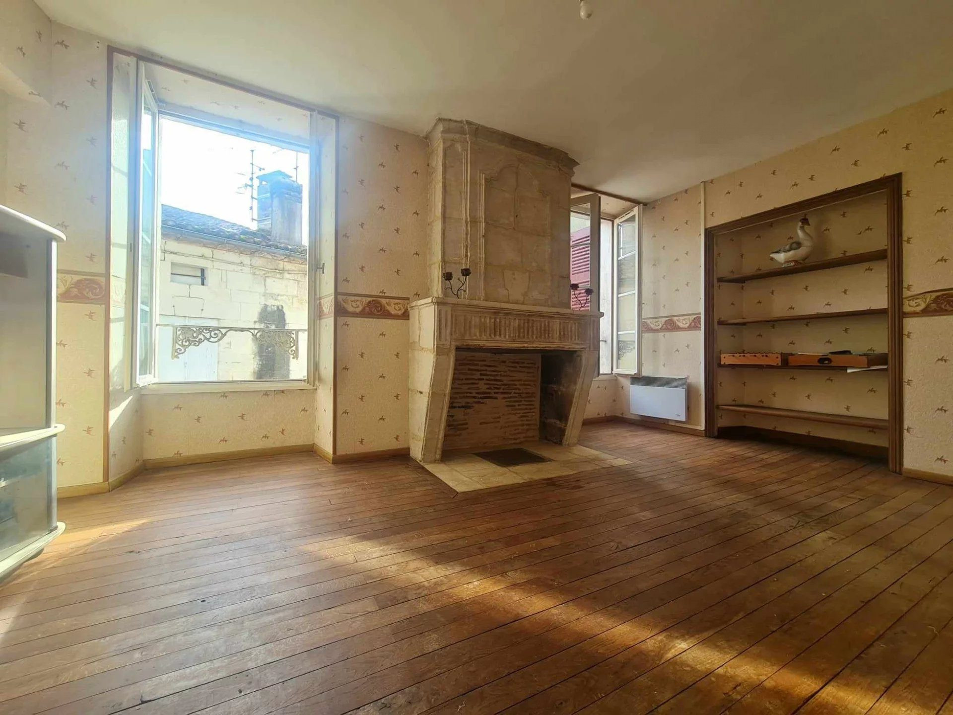 In the Heart of Aubeterre Building with Commercial Space and Apartment 4