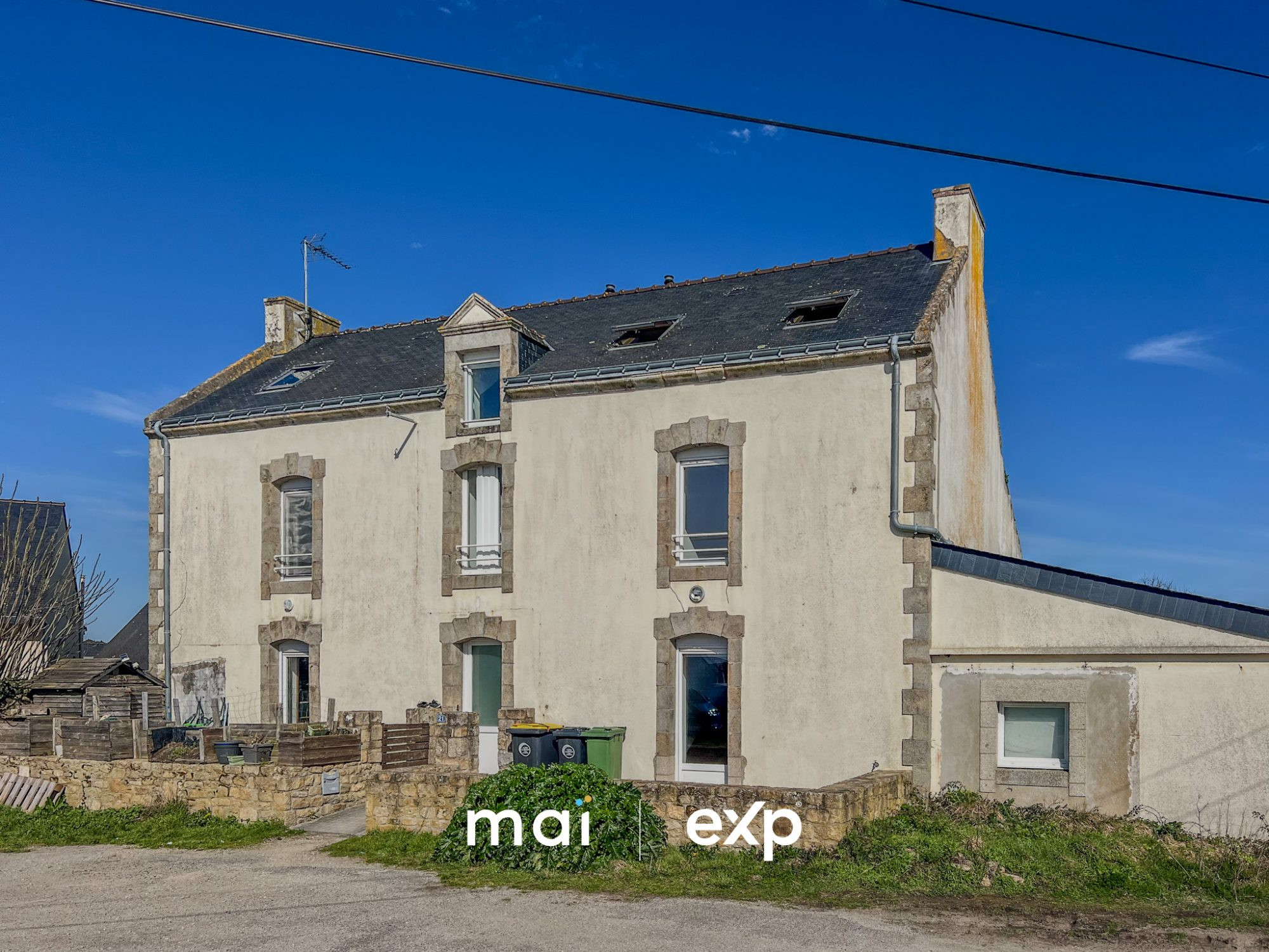 Ensemble immobilier avec deux duplex à vendre – Investissement locatif et grange à aménager