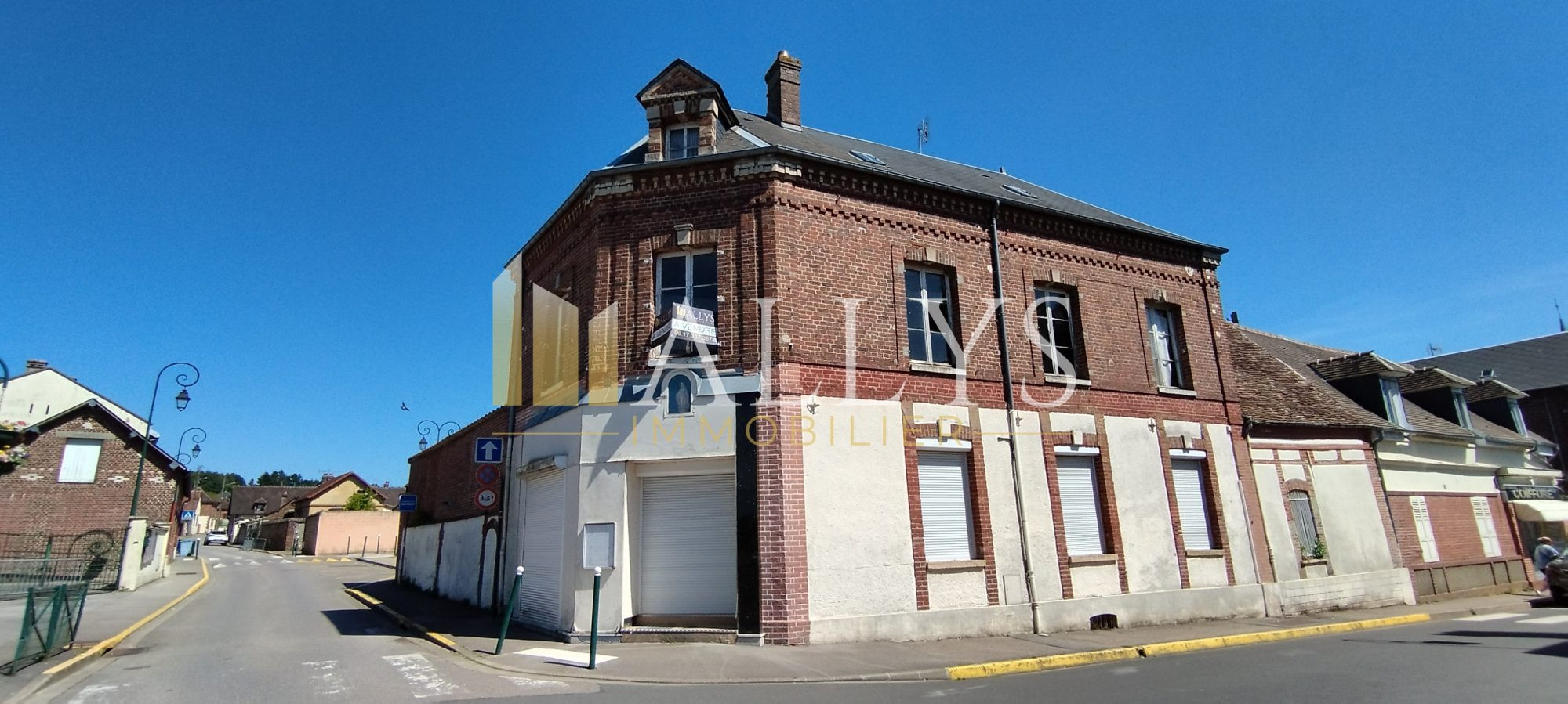 Immeuble 6 pièces et commerce 226m²