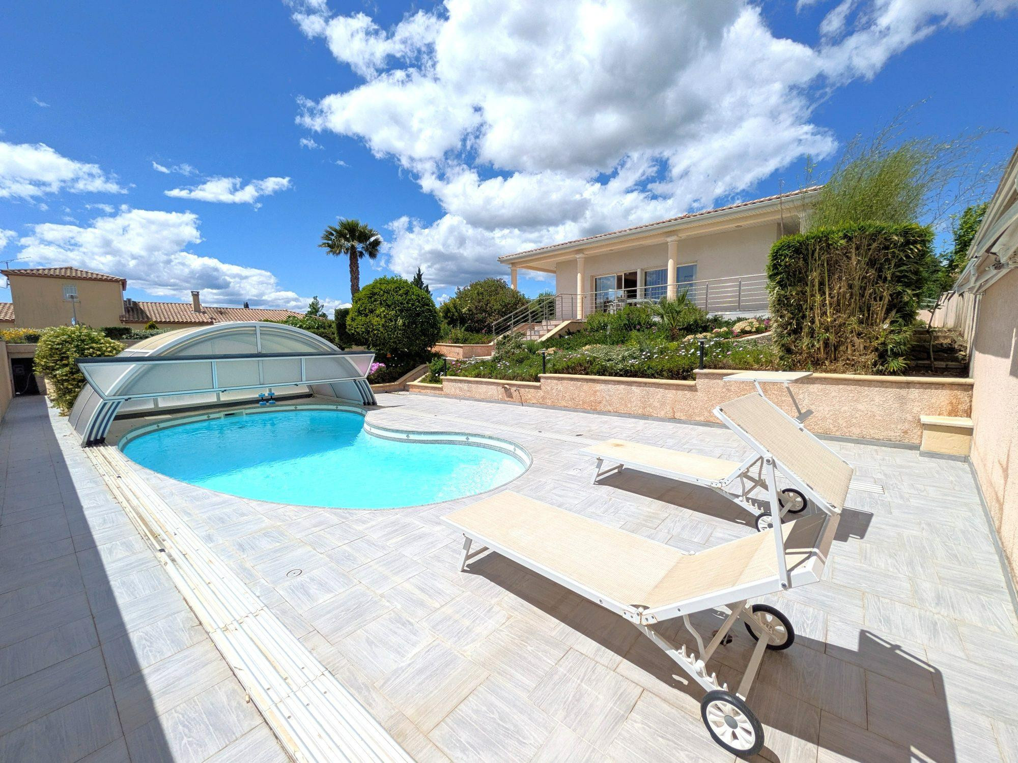 villa de style louisiane de 156 m2 et 180 m2 de sous sol située a puissalicon à 10 minutes de Beziers sur un terrain de 1161 m2