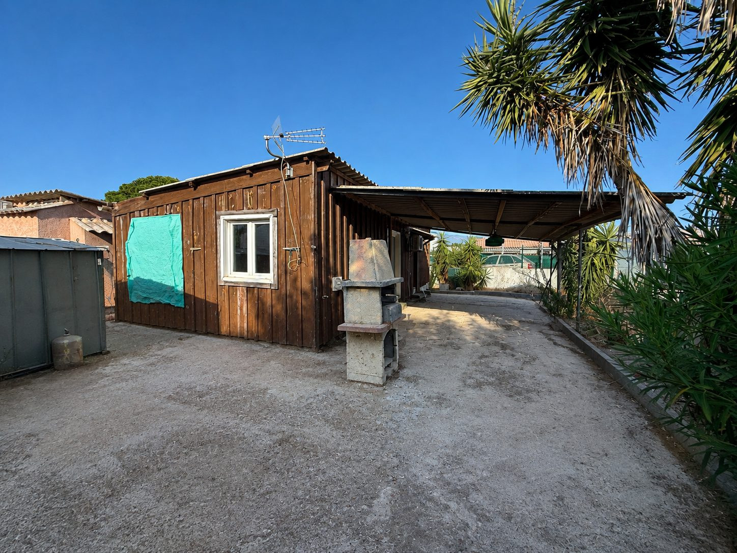 Buildable land with chalet and mobile home – 300 meters from the sea 2
