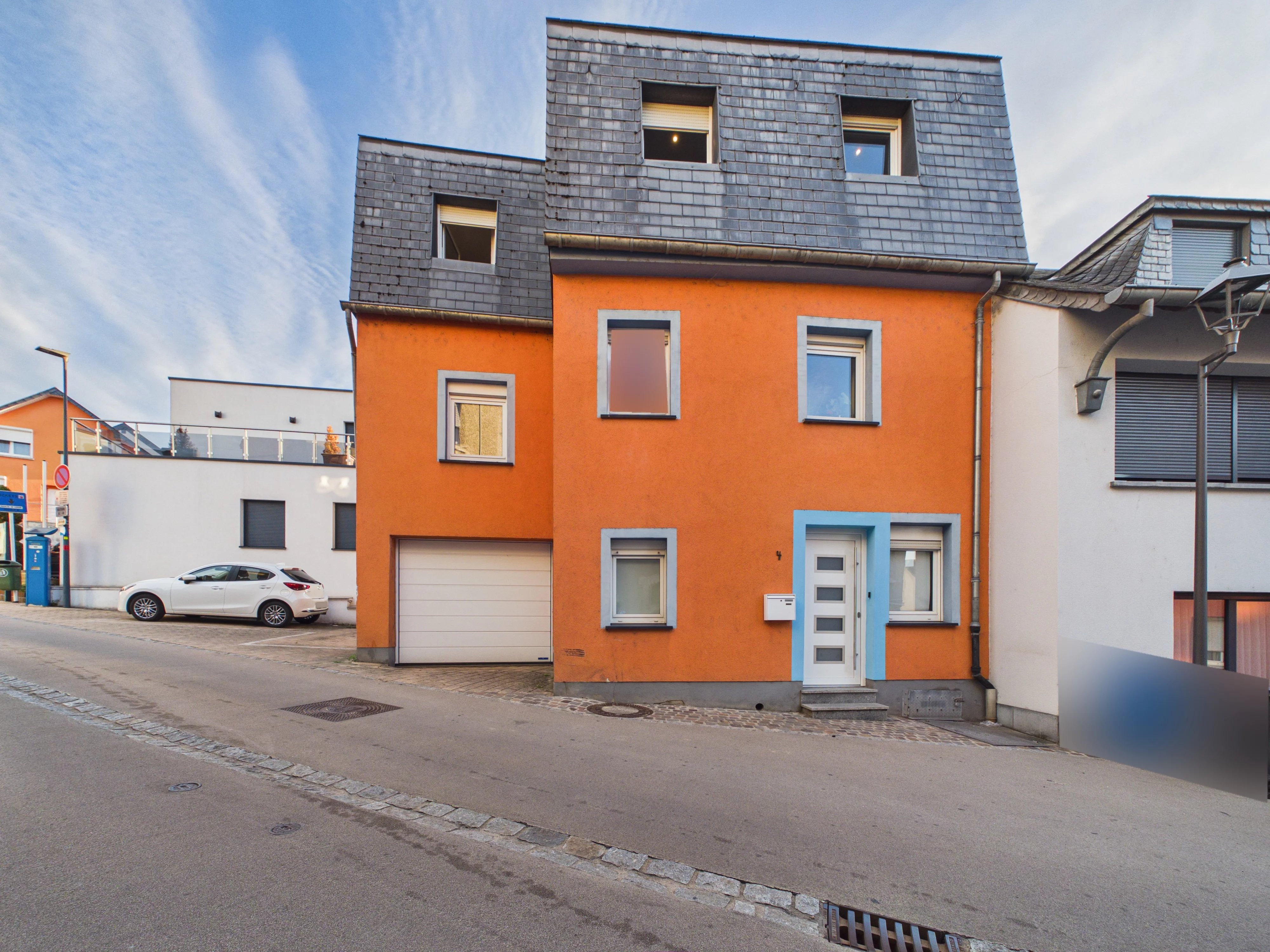 Maison jumelée avec garage et terrasse au centre d'Ettelbruck