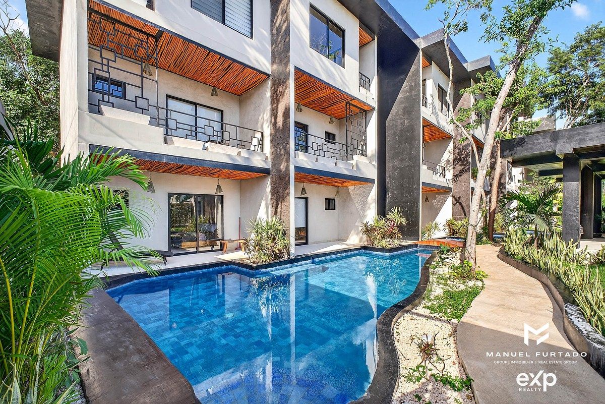 NEO+ by AREIA | Swim Up | Departamento en Tulum Region 15