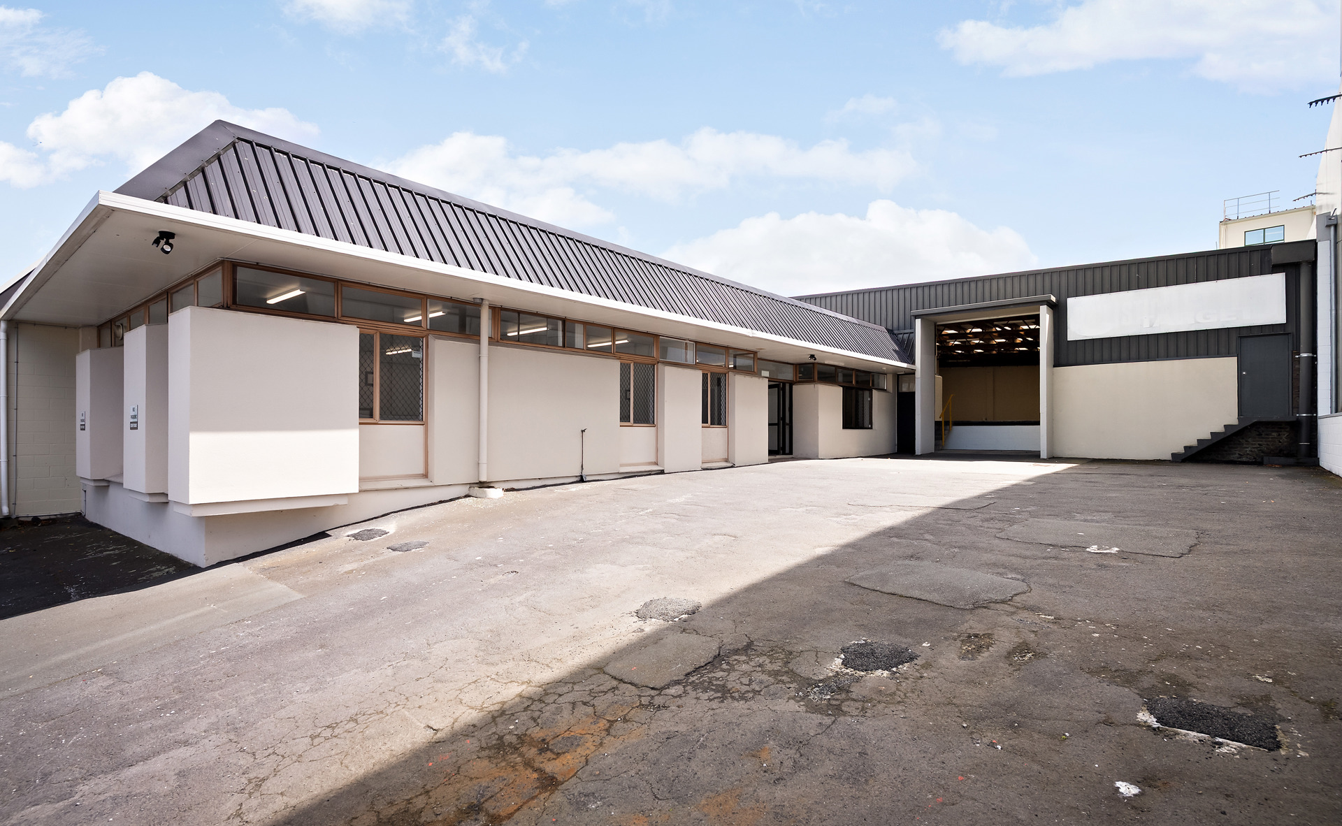 677SQM Cost-Effective Mt Eden Warehouse + 13 Car Parks