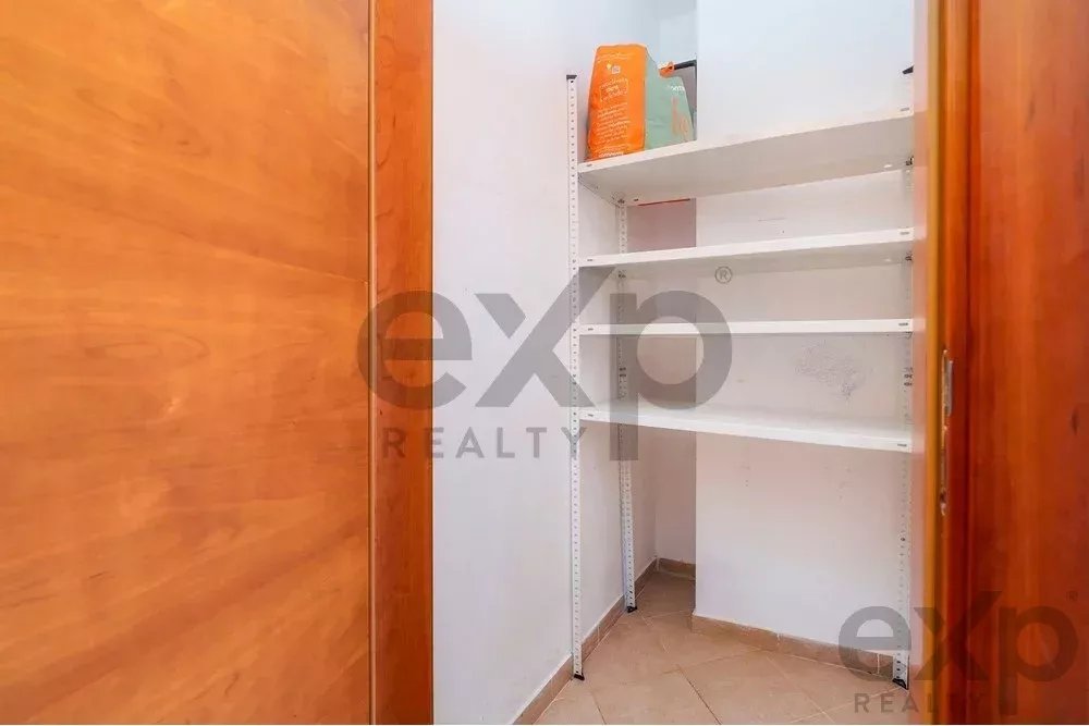 Spacious four‑bedroom apartment in Olhão, situated within a luxury condominium featuring two shared swimming pools and a gymnasium. Expansive interiors and terrace. 85948826 image 55
