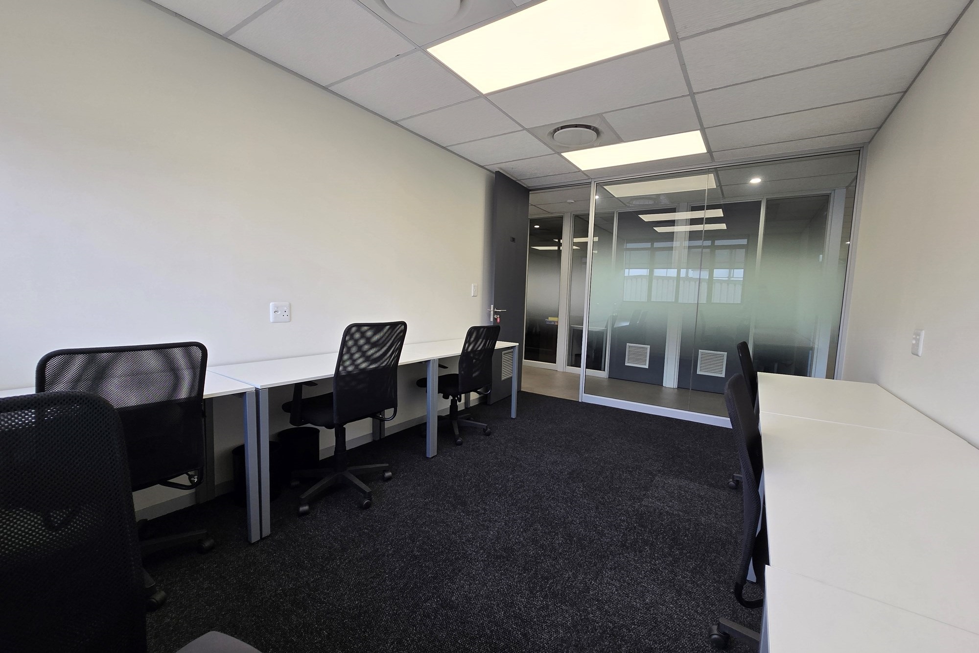 Elevate your workspace with this modern 6-person office