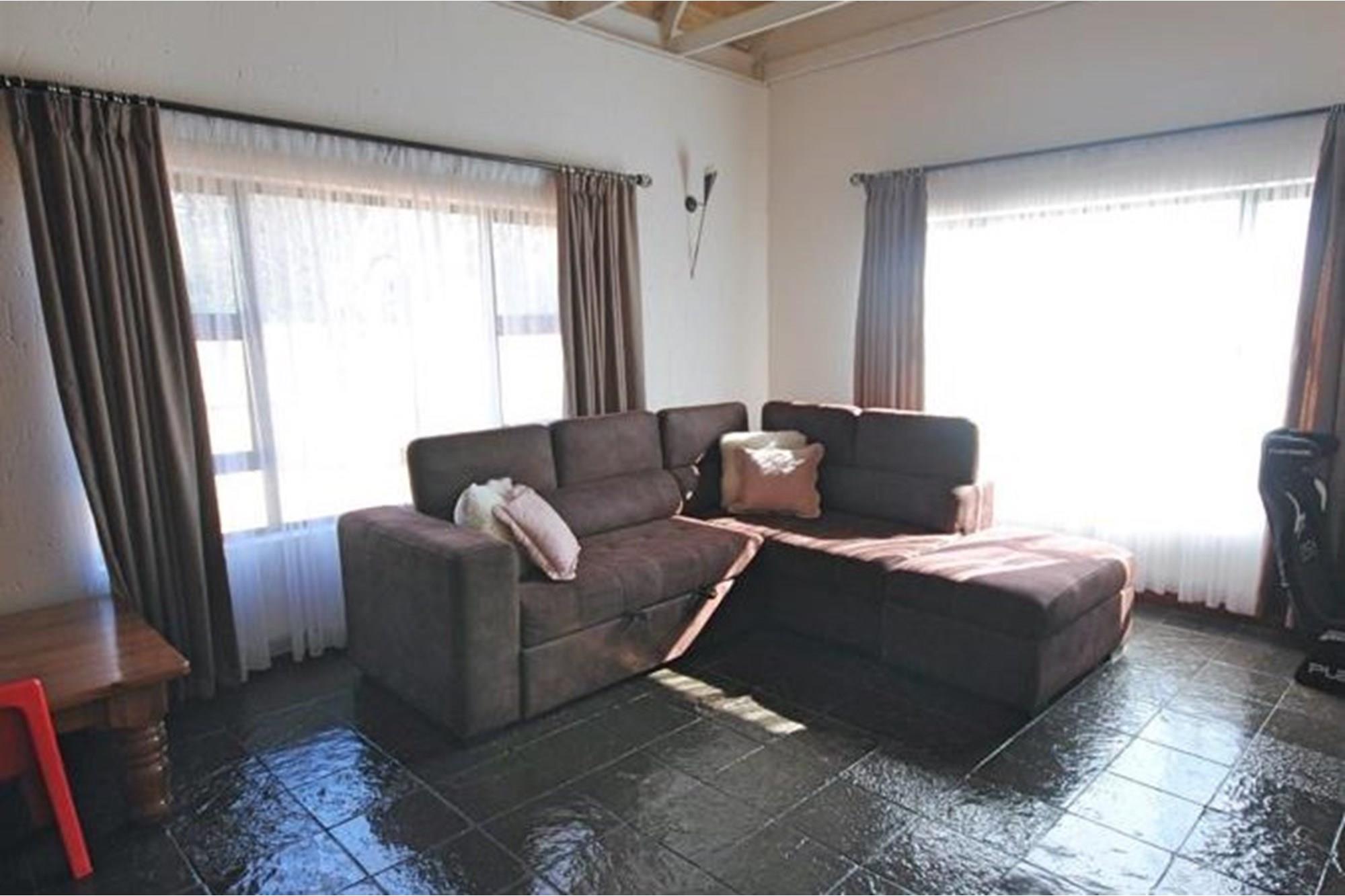 "Luxurious 4-Bed Family Home in Vaalpark Oasis"