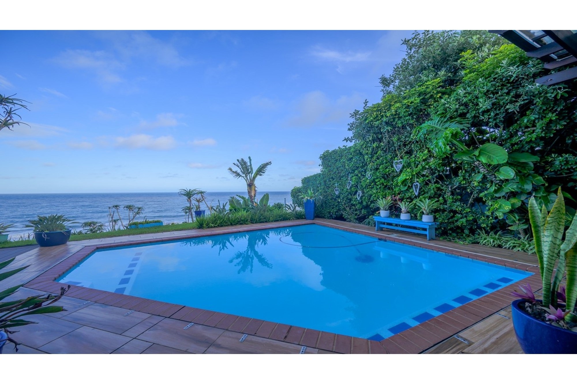 Accepting Reasonable Offers -Stunning Beachfront Home with Three Income Generating Apartments