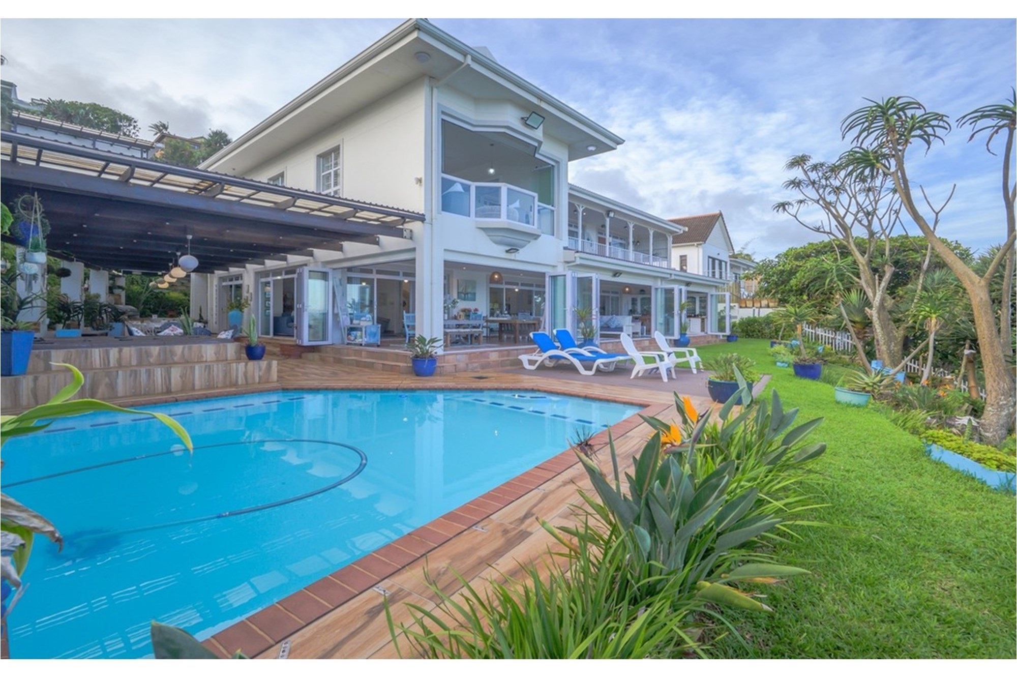Accepting Reasonable Offers -Stunning Beachfront Home with Three Income Generating Apartments