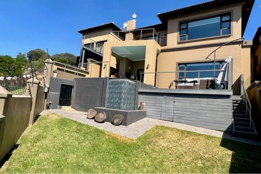 Magnificent secure exclusive cluster set high up on the hills with views for days