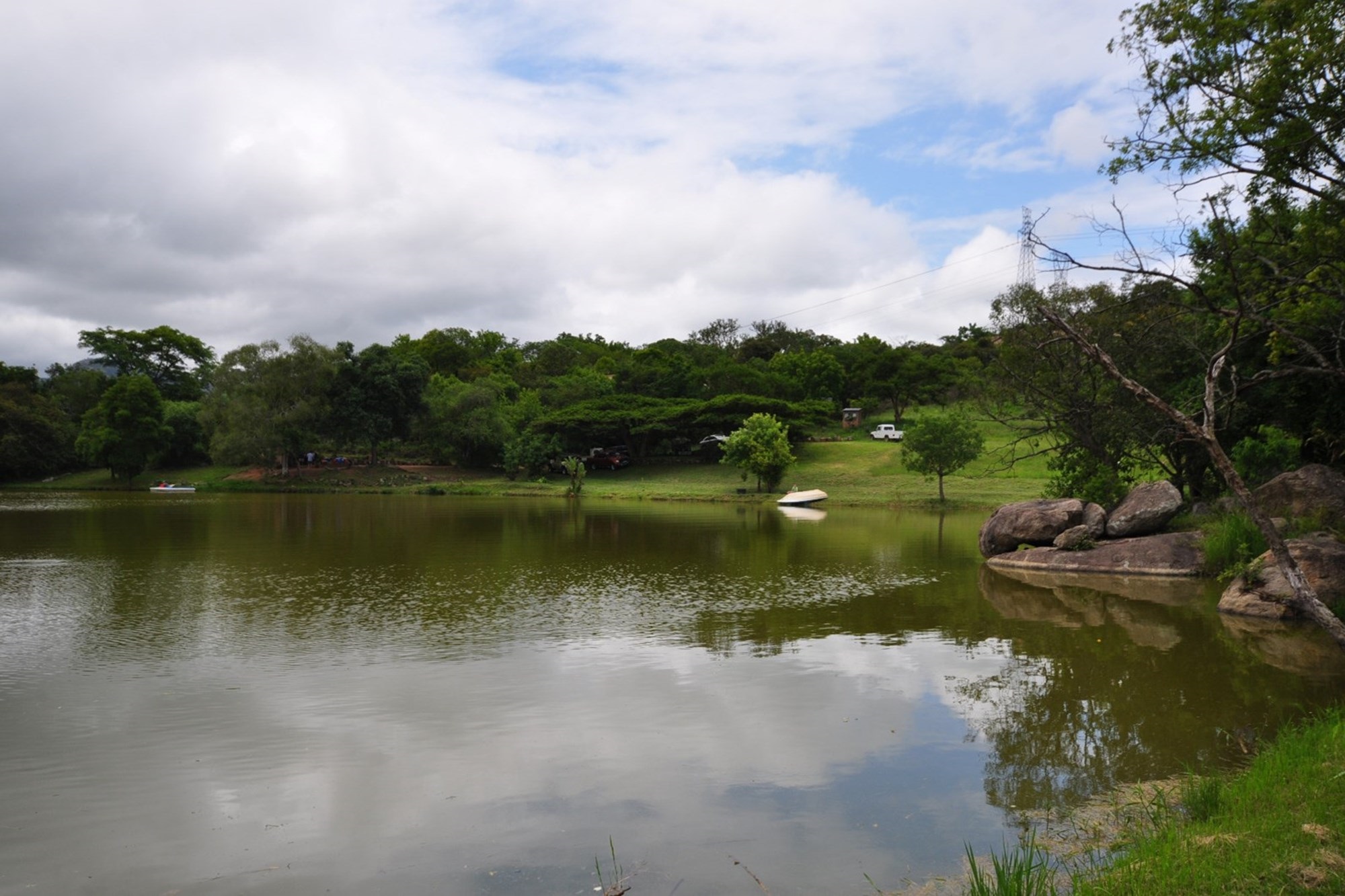 Scenic farm with hills and dam close to Karino