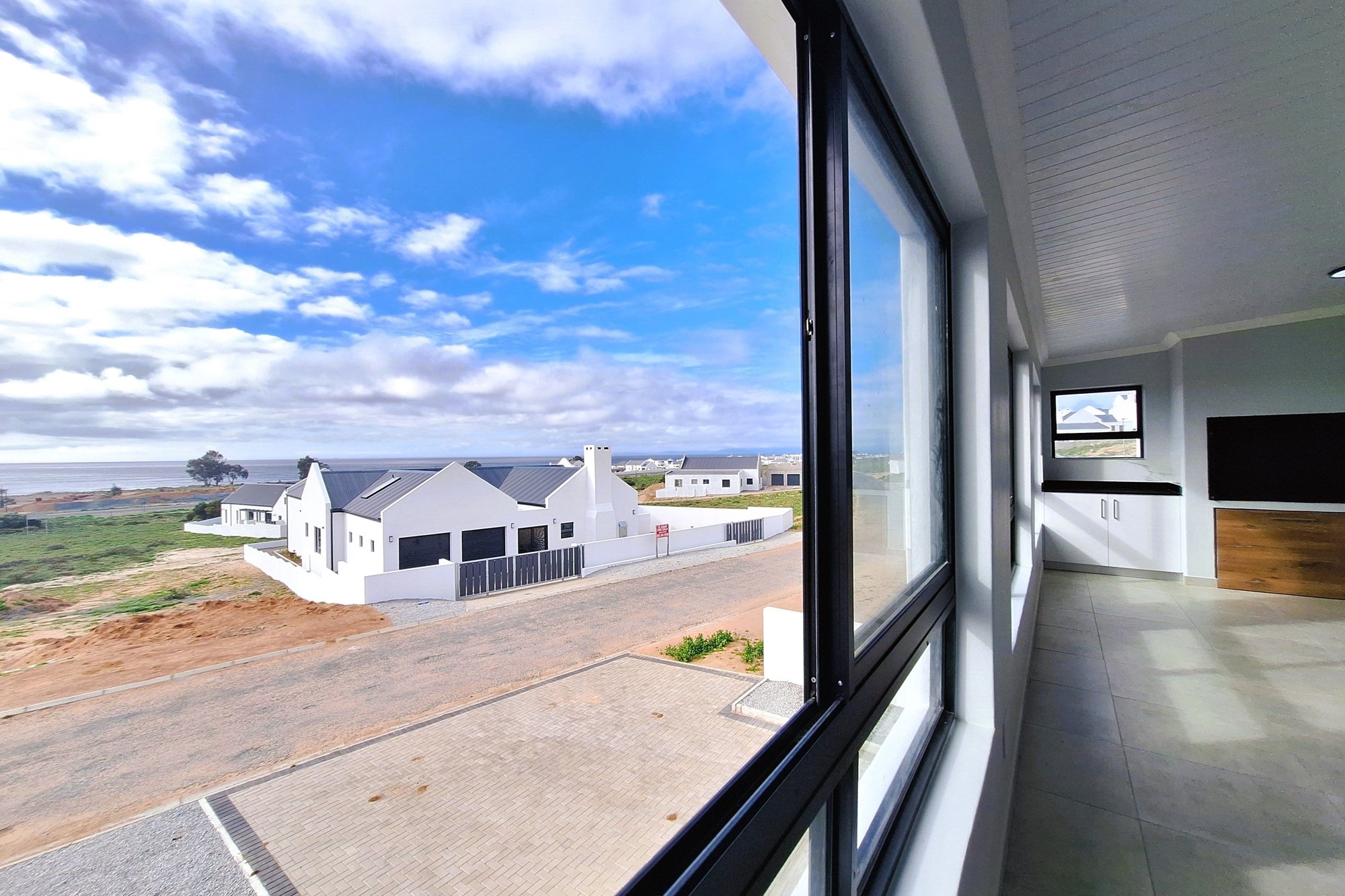 Dual-Level Coastal Home with Flatlet and Ocean Views in Da Gama Bay, St Helena Bay.