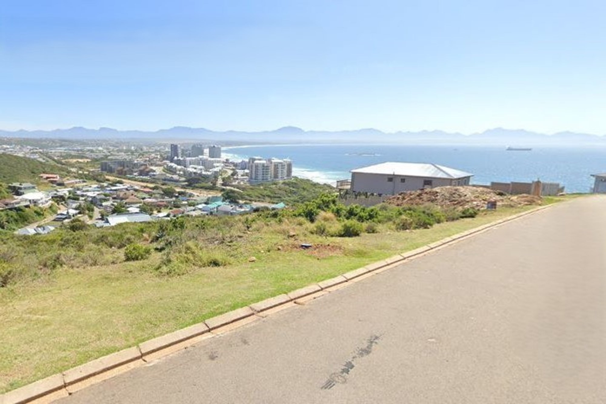 This plot offers breathtaking valley and sea views that promise serene and picturesque living