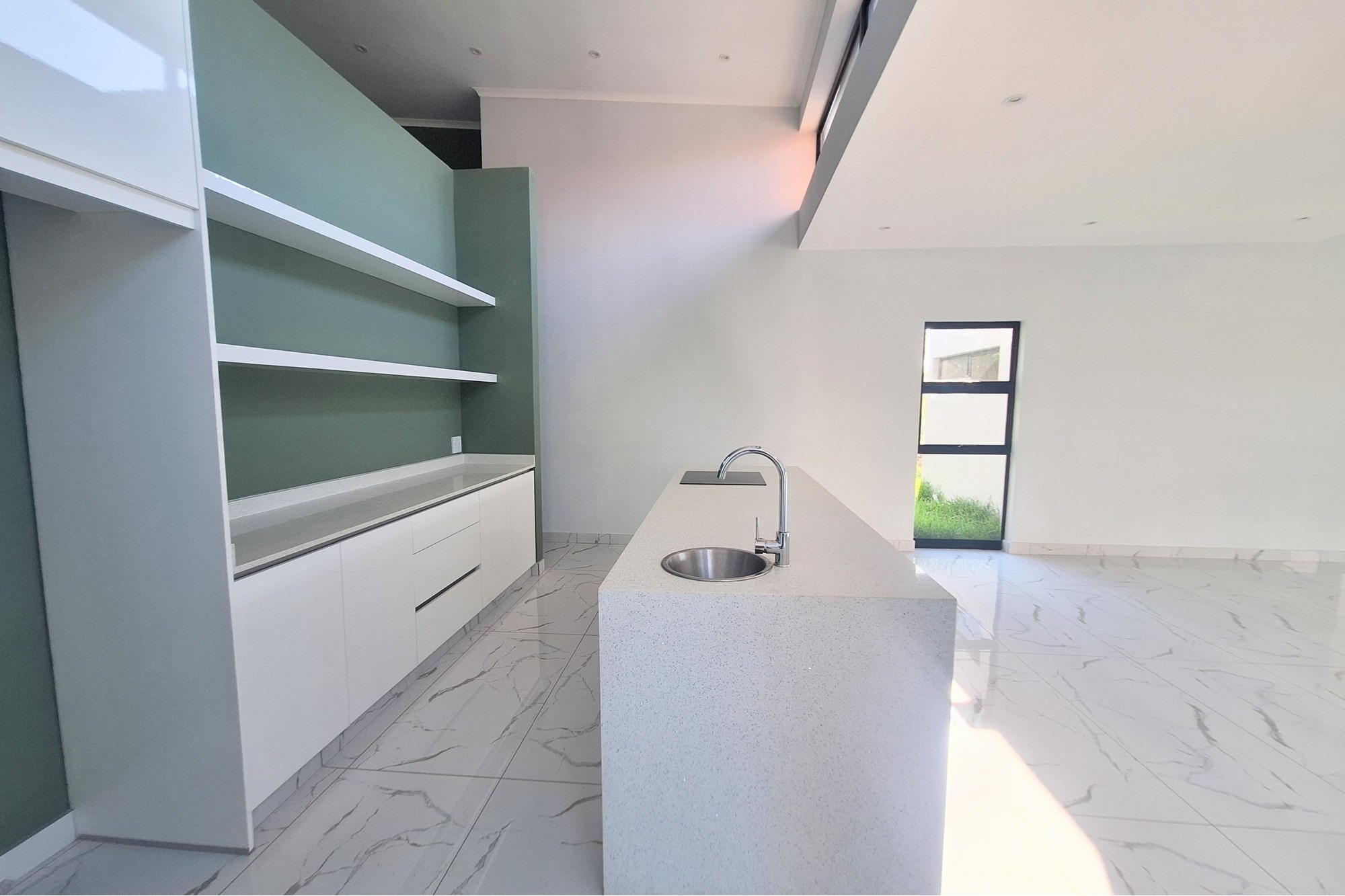 Modern Elegance Meets Coastal Tranquility at Palm Lakes Estate