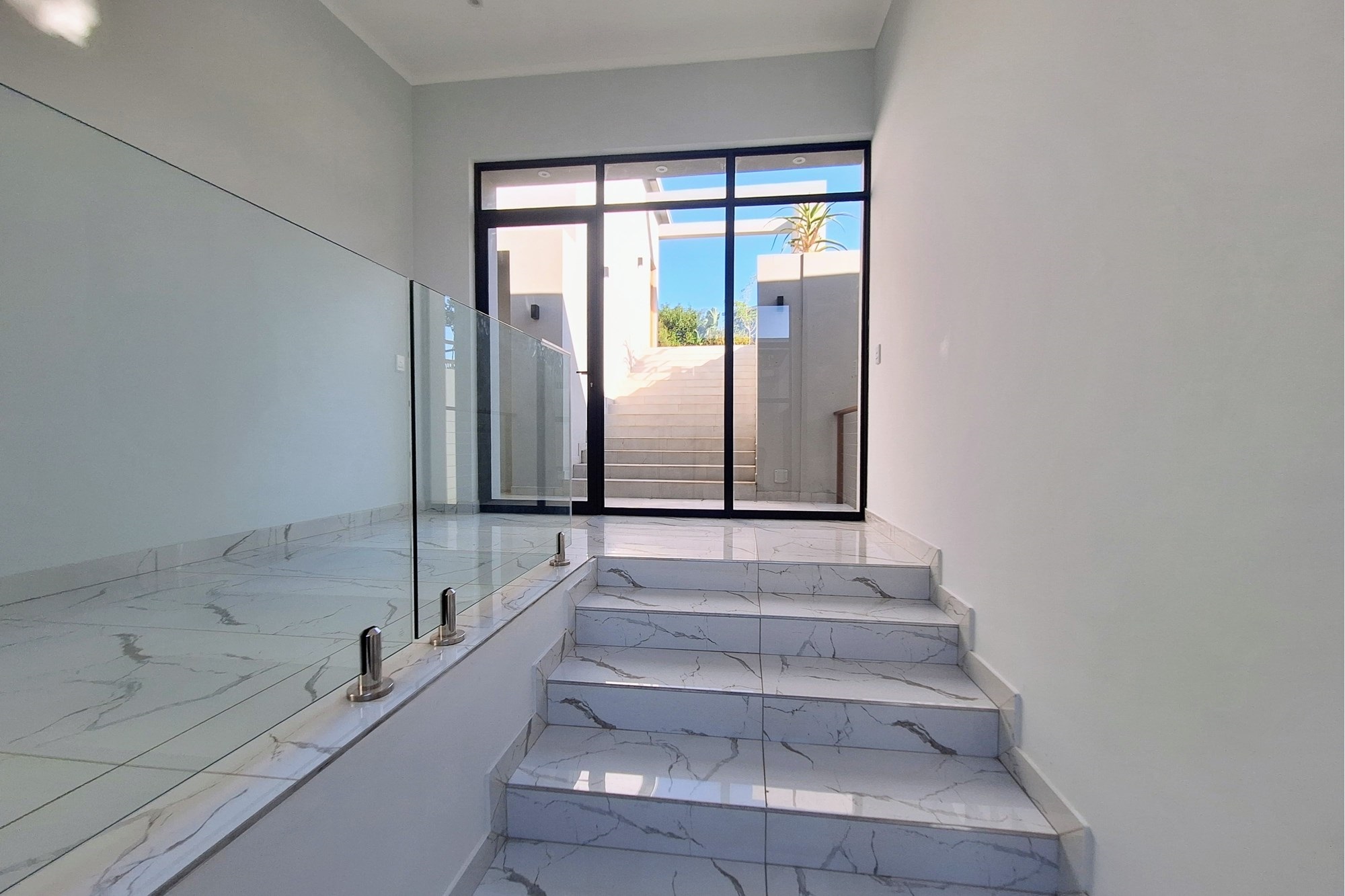Modern Elegance Meets Coastal Tranquility at Palm Lakes Estate