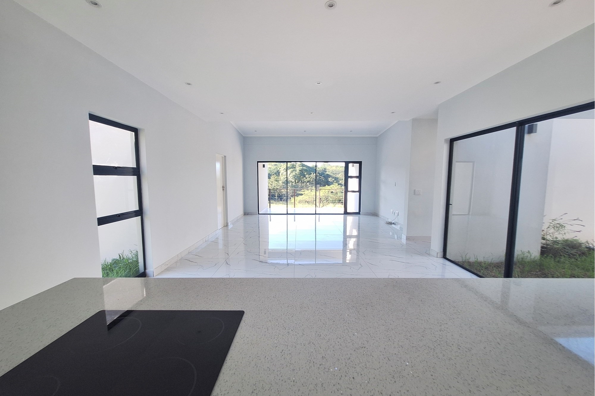 Modern Elegance Meets Coastal Tranquility at Palm Lakes Estate