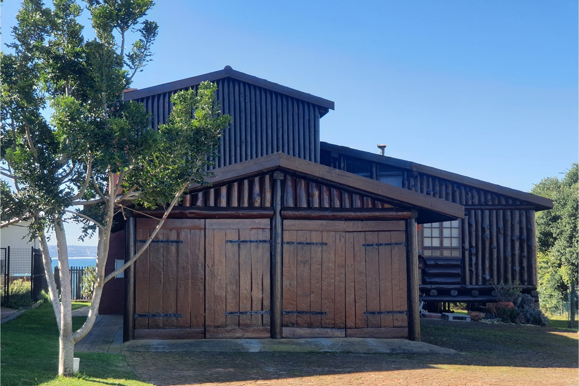 A Handcrafted Log Home Masterpiece in Boggomsbaai