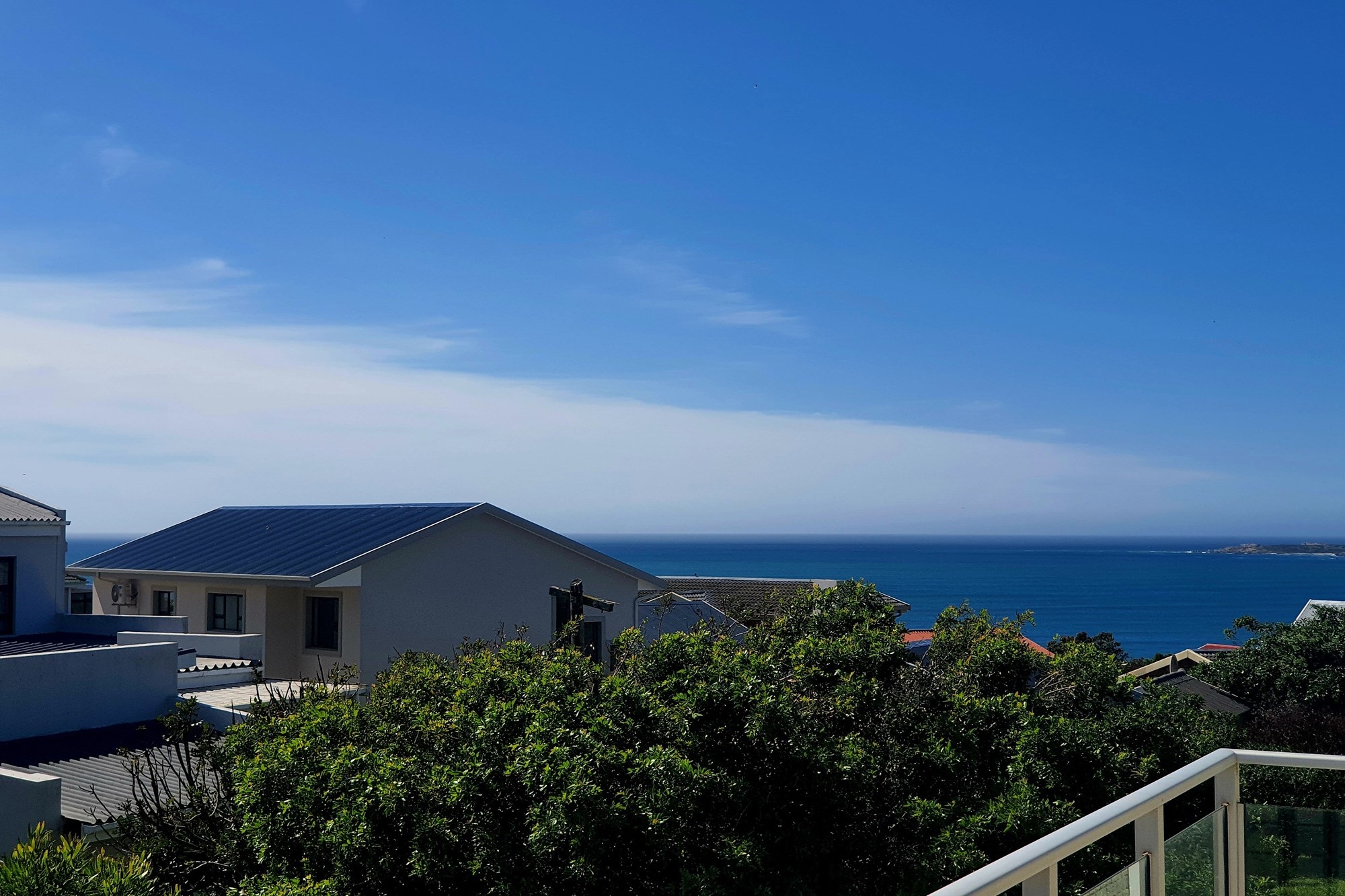 Elegant Double-Story Home with Sea Views