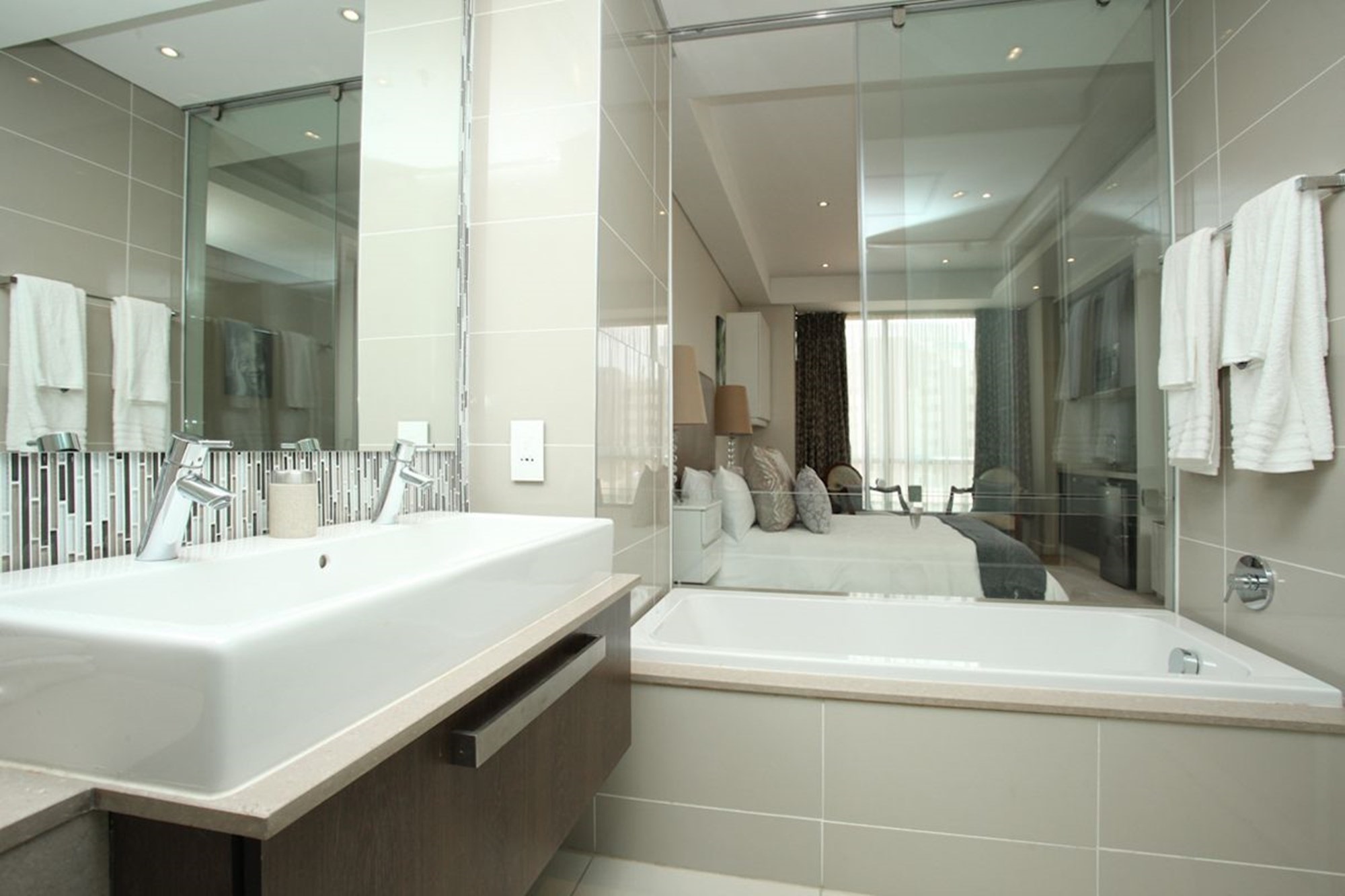 “Luxury Living in Sandton Skye: Fully Furnished Apartment with World-Class Amenities”