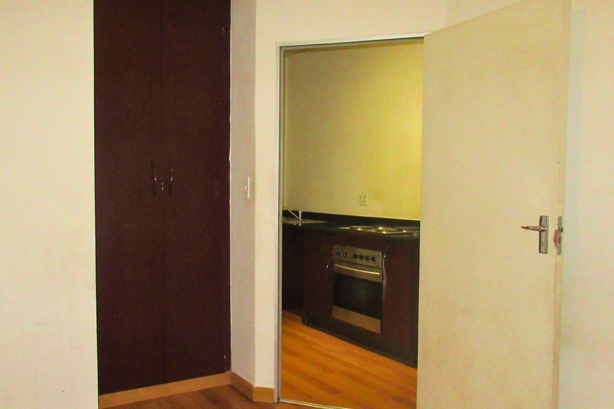 "Chic Urban Living: 1-Bed in Gauteng's Heart"