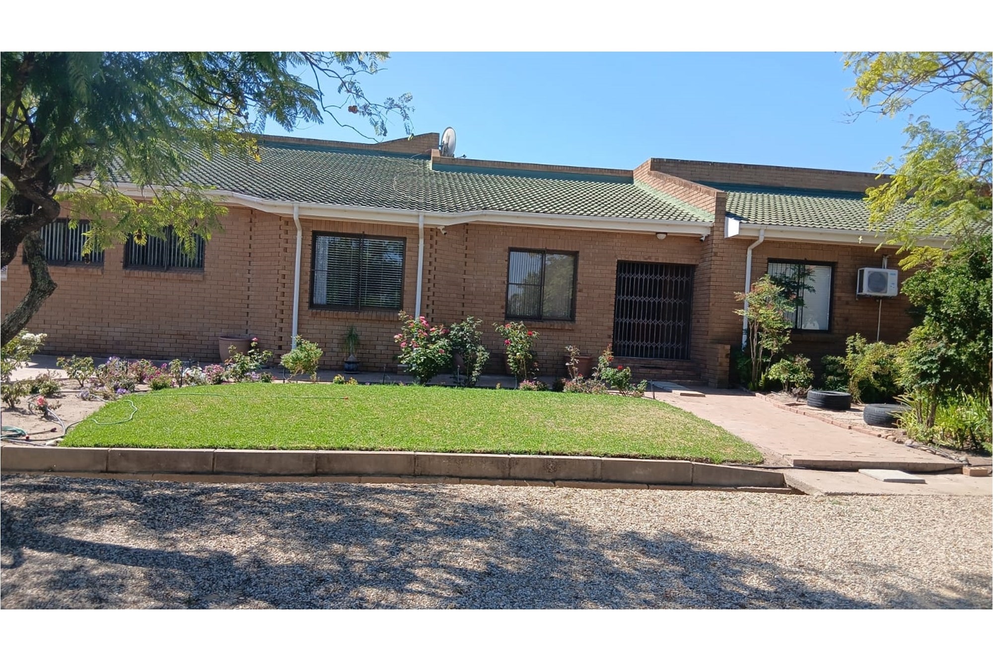 "Exquisite 5-Bedroom Facebrick Home in Tranquil Porterville"
