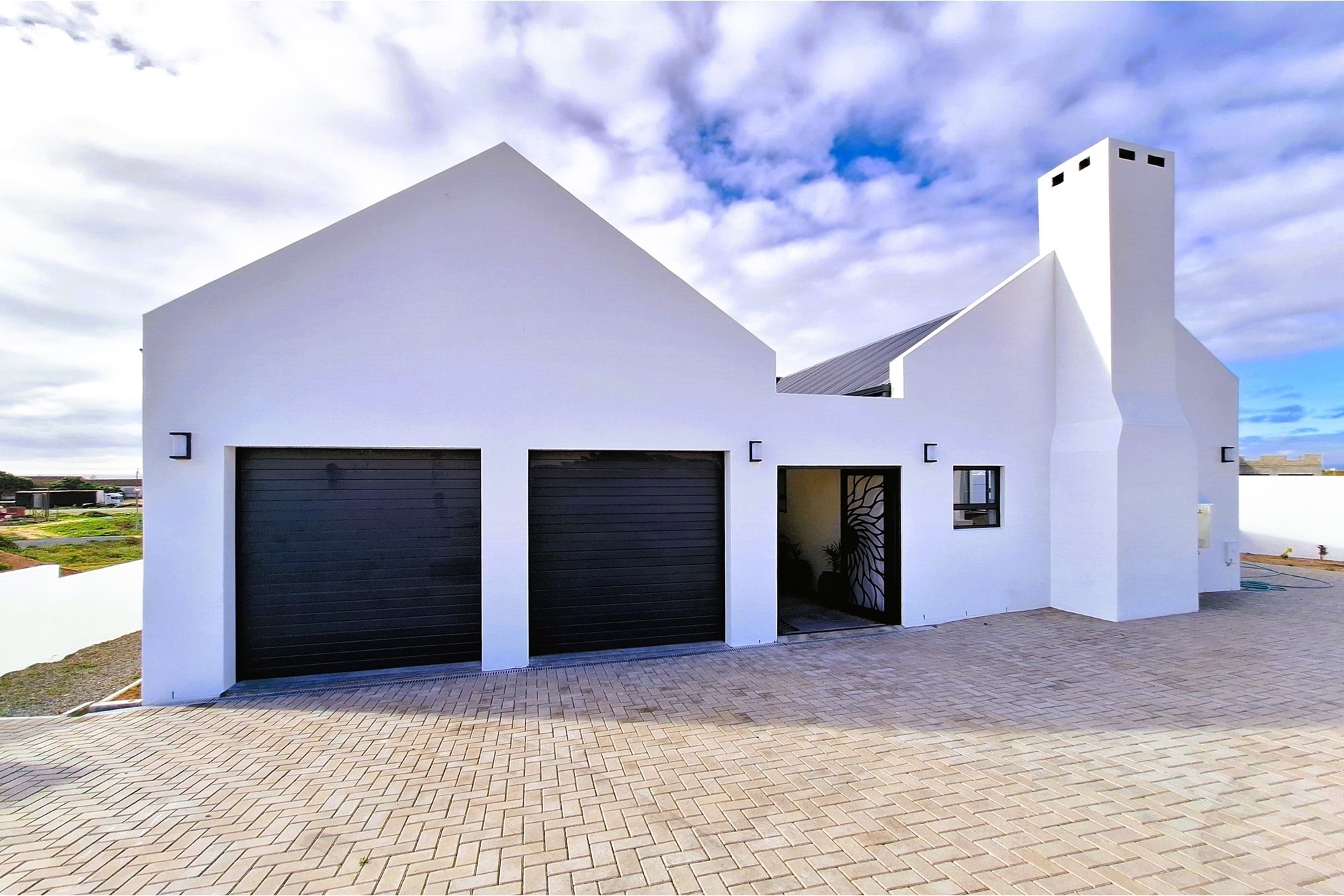 Spacious, Modern Family Home with Separate Flatlet and partial Sea Views in popular Da Gama Bay. 2