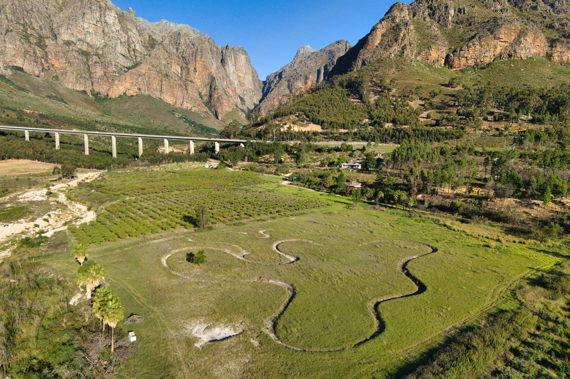 A river runs through 14.7 hectares of fertile terroir with incredible views