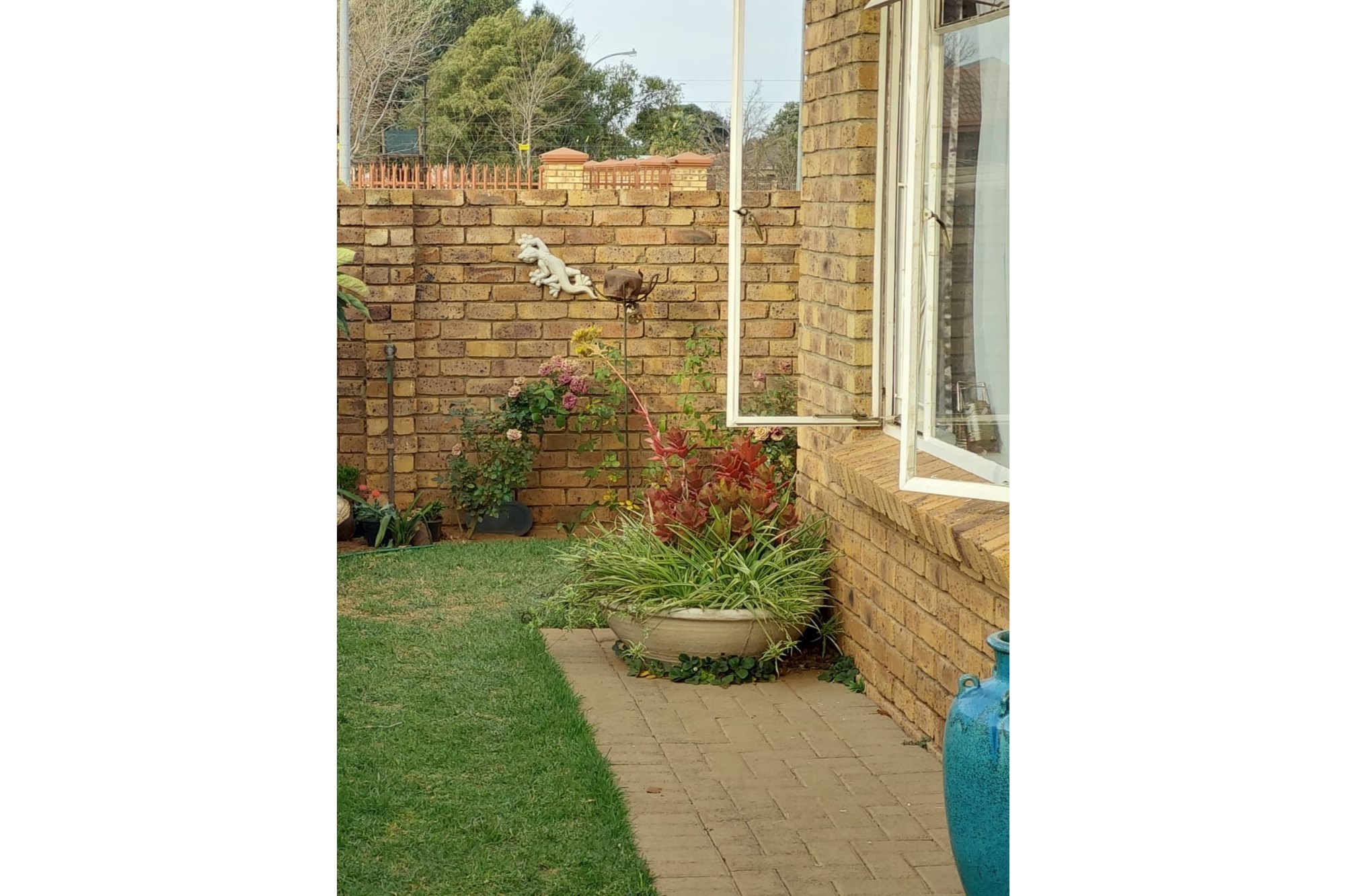 Charming Two-Bedroom Townhouse in Established Area