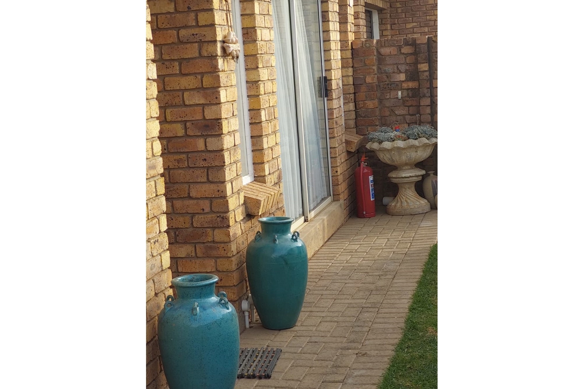 Charming Two-Bedroom Townhouse in Established Area