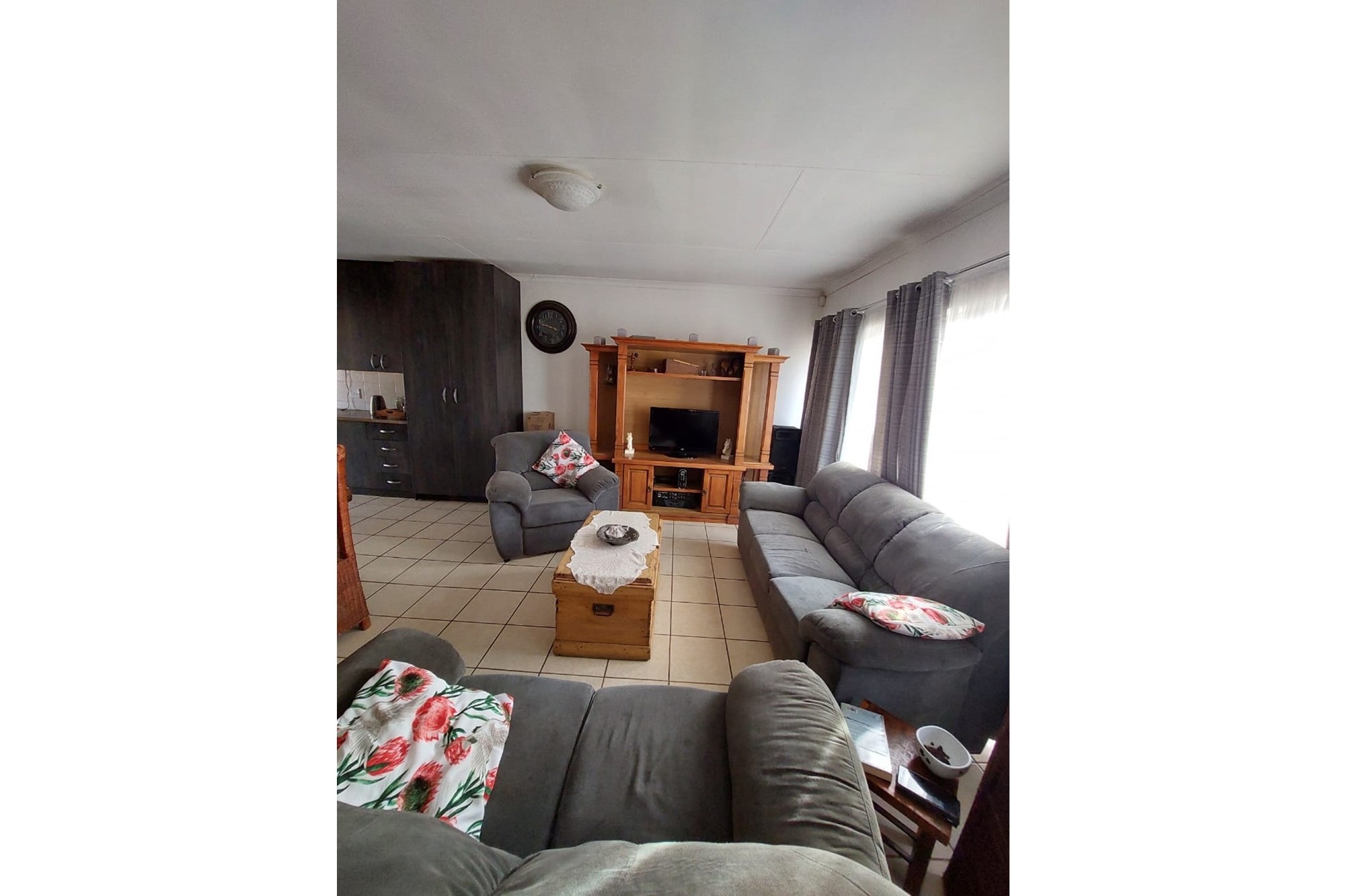 Charming Two-Bedroom Townhouse in Established Area