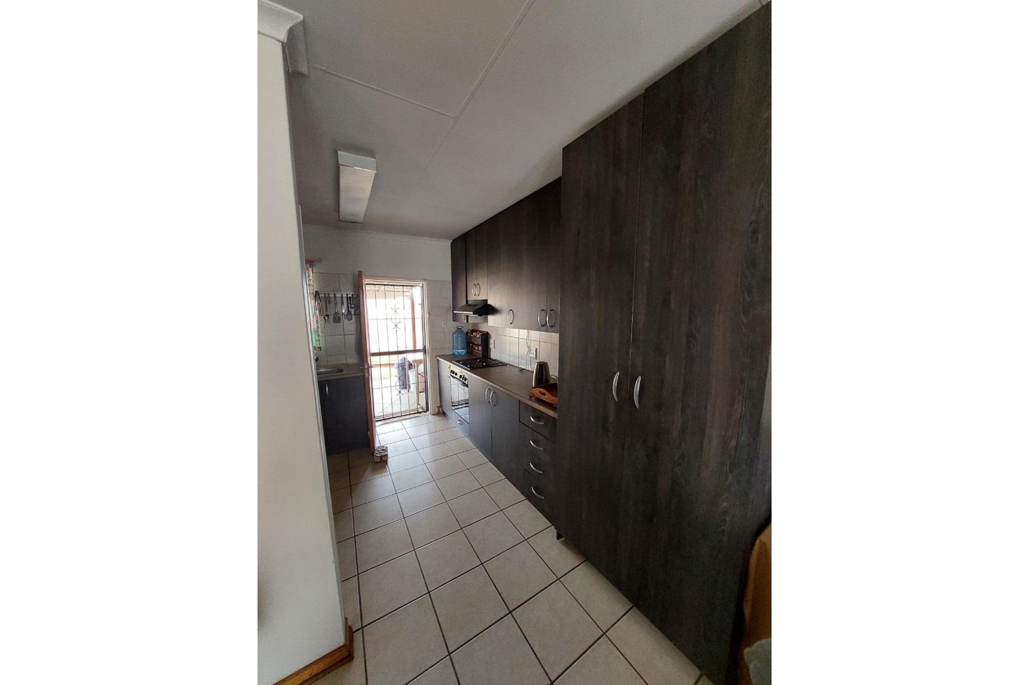 Charming Two-Bedroom Townhouse in Established Area